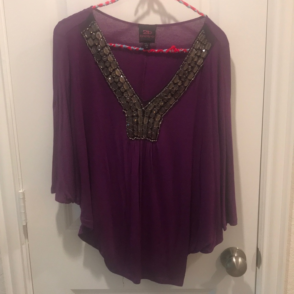 2B Bebe Purple top with large rhinestone in XS